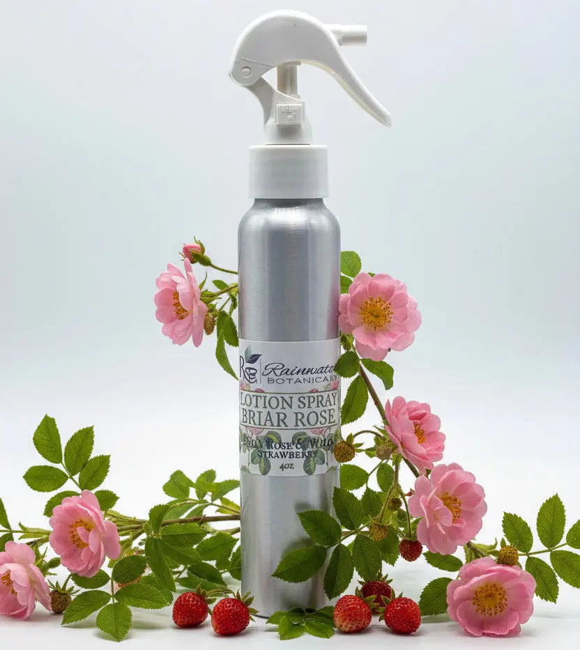 Silver lotion spray bottle with a label on a white background