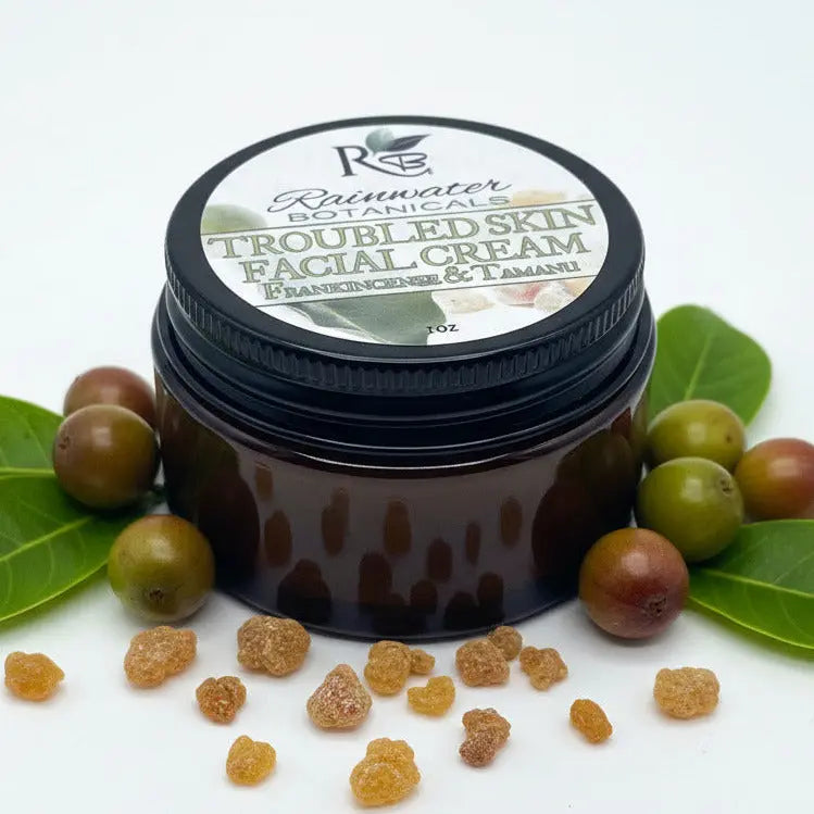 Jar of Rainwater Botanicals Troubled Skin Facial Cream on a white background