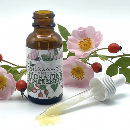 Bottle of Rattanwood Botanicals Hydrating Primer Serum with dropper on a white background