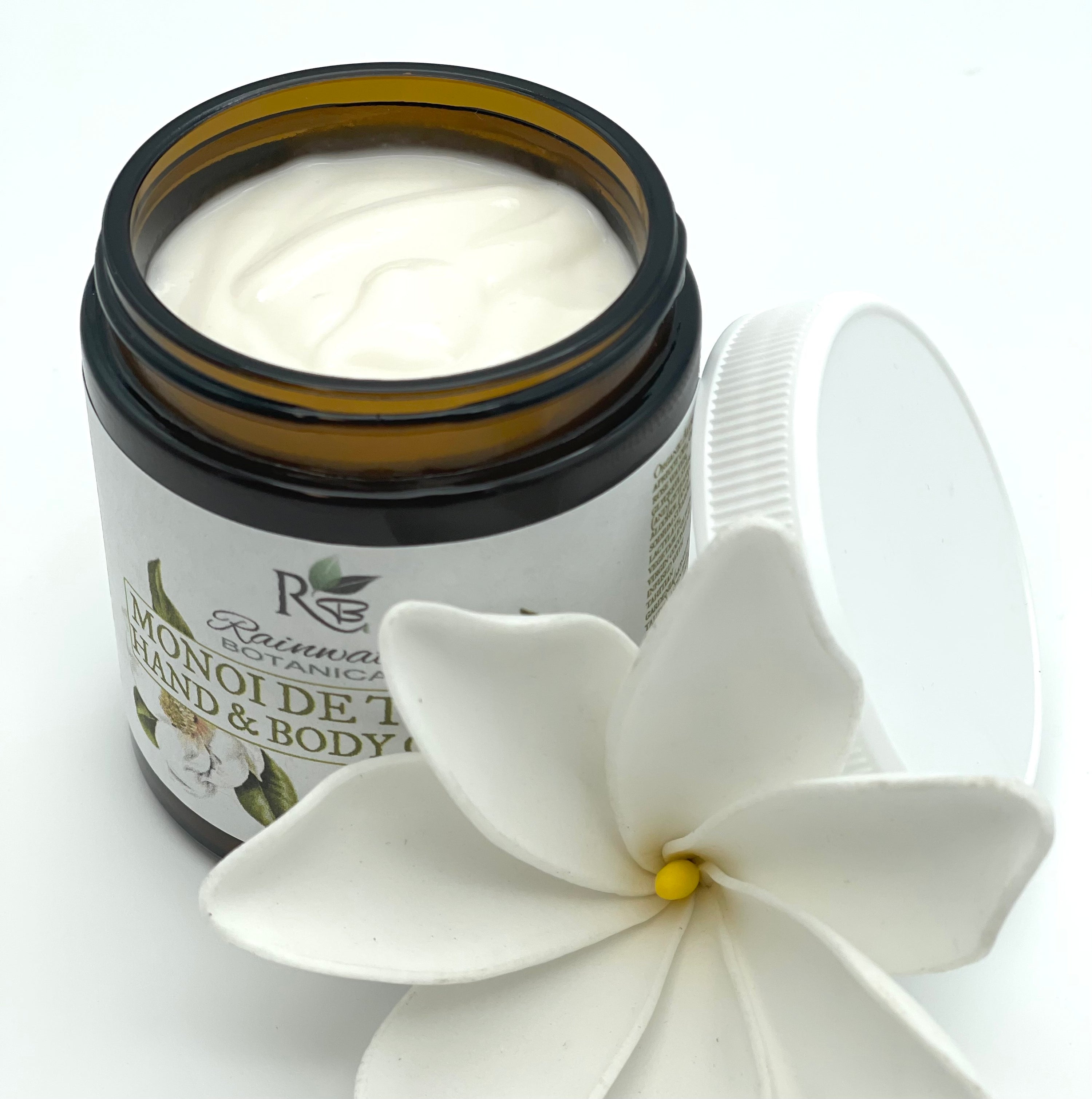 Monoi De Tahiti natural hand and body cream with hyaluronic acid in eco friendly glass packaging