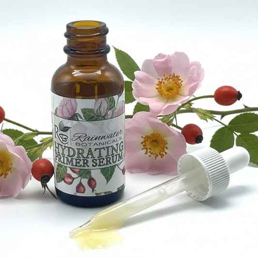 Bottle of Rattanwood Botanicals Hydrating Primer Serum with dropper on a white background